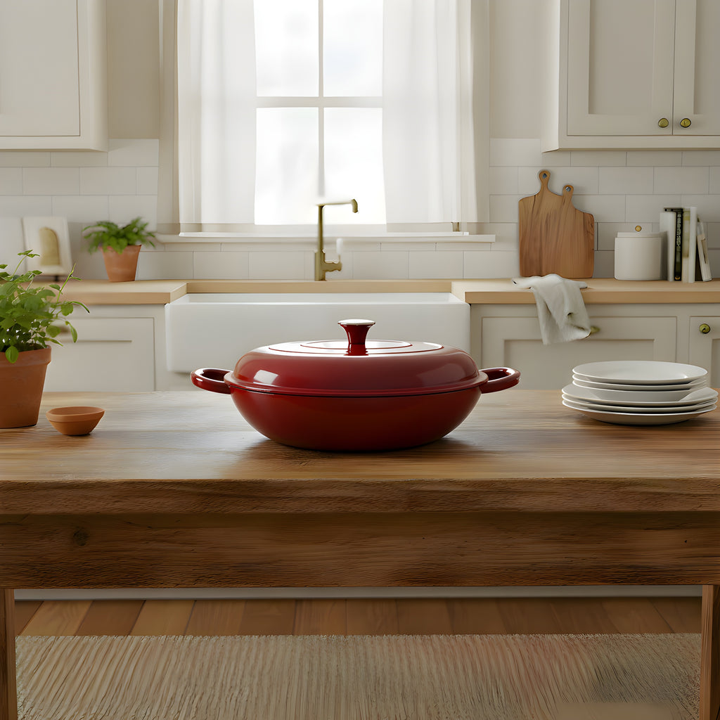 Red casserole dish on a wooden kitchen counter with a white kitchen background