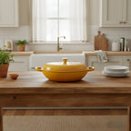 Yellow casserole dish on a wooden kitchen island with a modern kitchen background